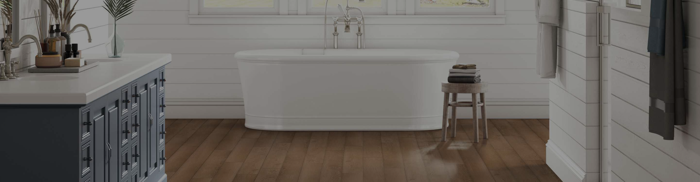 Vinyl flooring in bathroom with soaker tub and window treatments